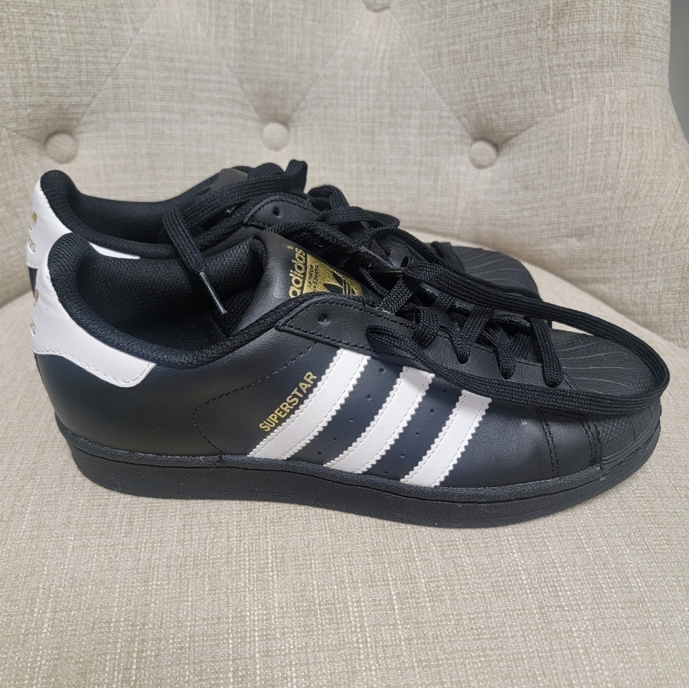Kids Adidas black and white superstar sneakers. Size 5.5